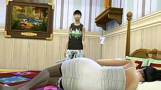 mom and boy shares bed in a motel room