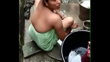 asian mom bathing her teen son