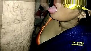 kinky teen rubs her wet panties on her cunt in bed