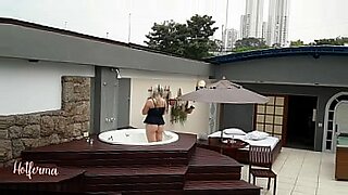 blonde skinny harlot strips down slowly on the edge of the roof