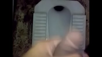 girl pissing in publik toilet