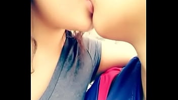 mom and daughtor french kissing