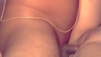 two man sucking woman nipples